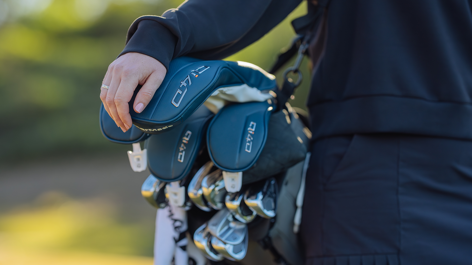 How to Choose the Right Golf Clubs (Complete Buying Guide) a close up of a bag of womens golf clubs which can be used for beginners of advanced level