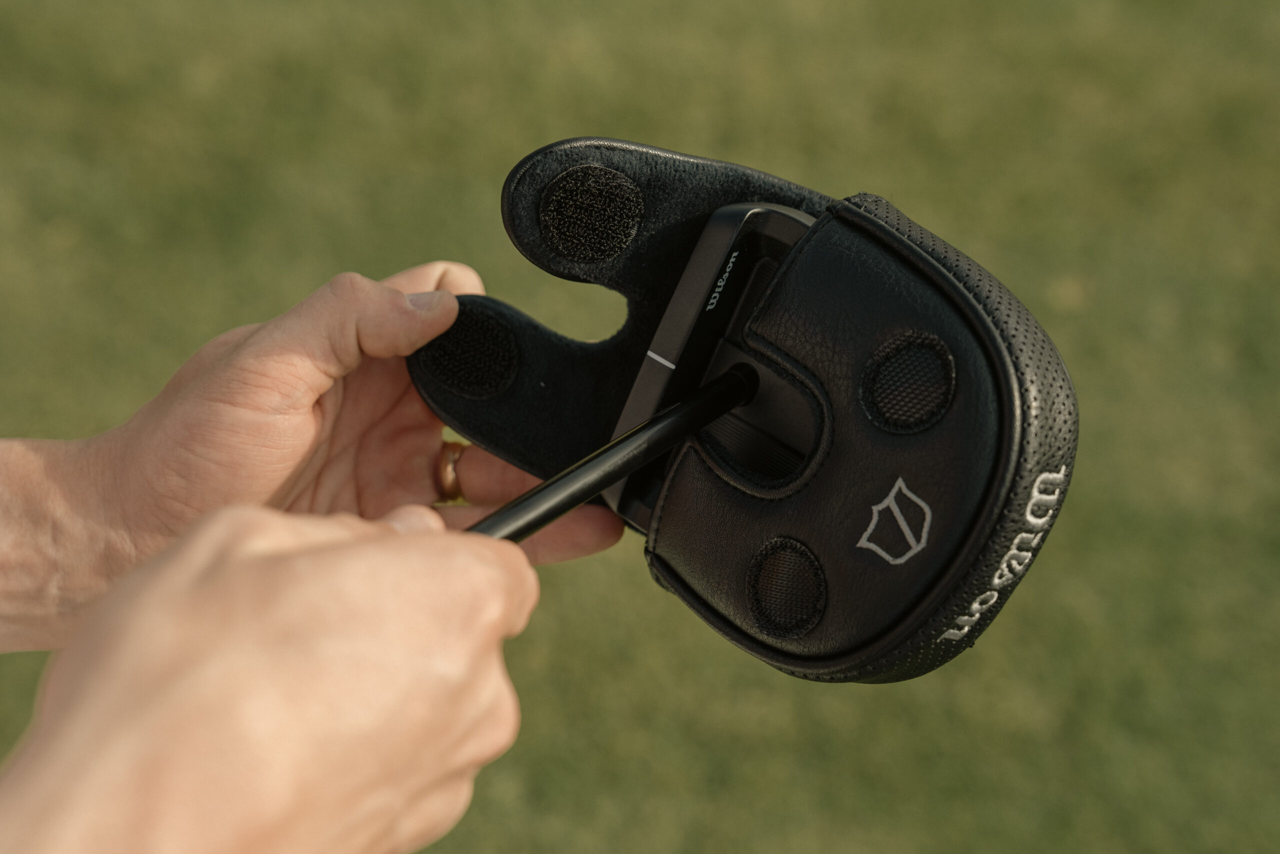 a close up look of the wilson infinite zt putter headcover
