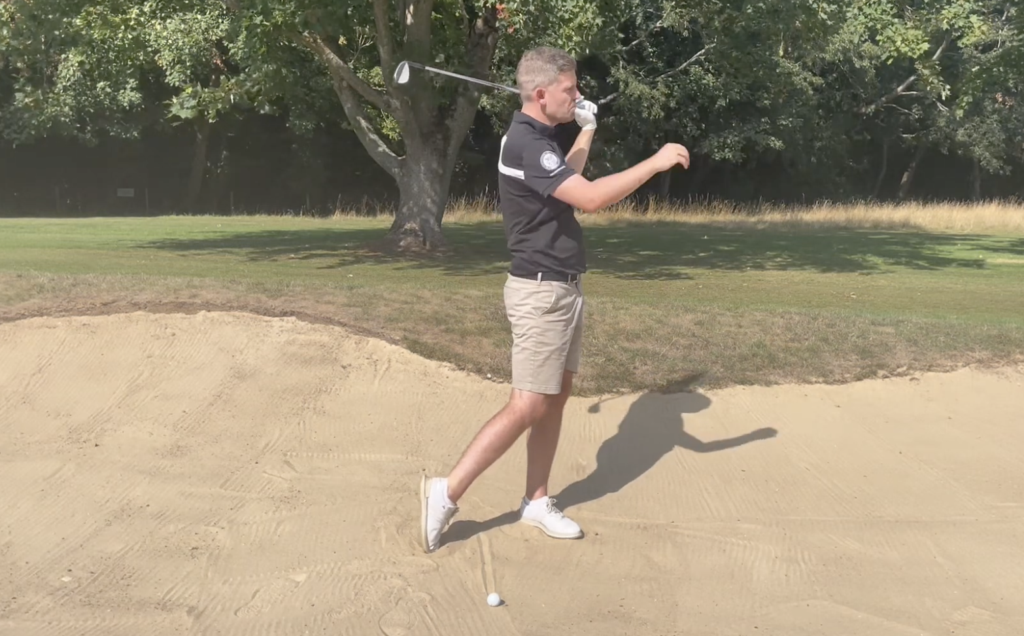 ian taylor shows that transferring your weight to target can help hit better fairway bunker shots