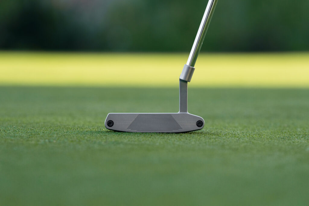 a close look at the milled face of taylormade systm 2 putter