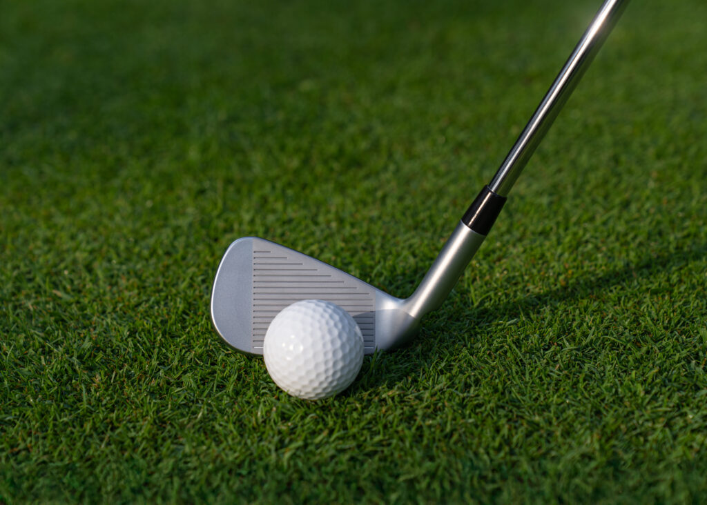 a close up of the ping i540 face at address